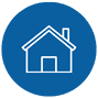 White house icon with a chimney on a blue circular background.